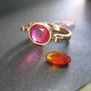 14k solid yellow gold ring with Rubylight.